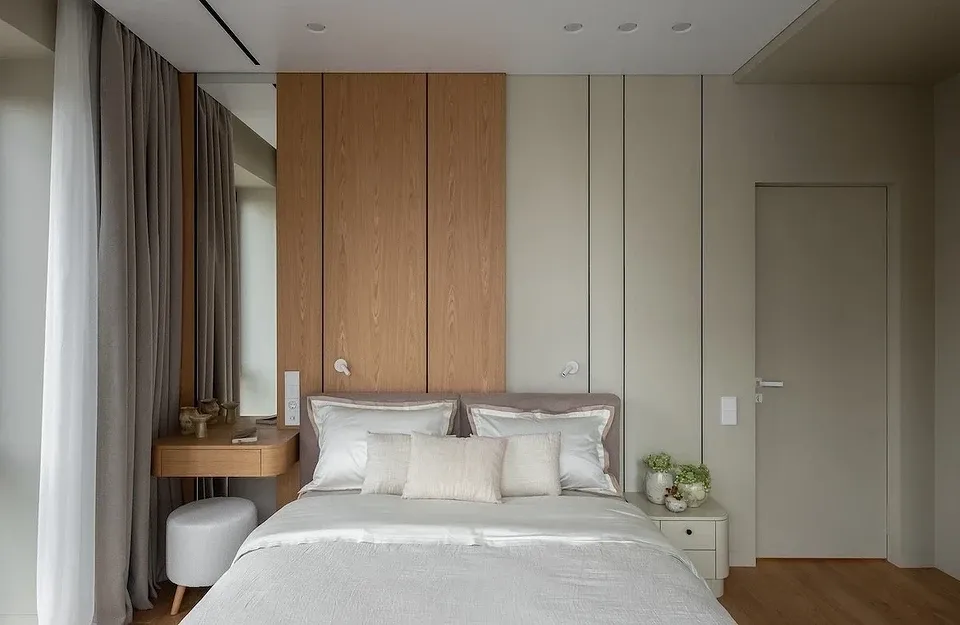 Blackout curtains behind sheer drapes for better sleep