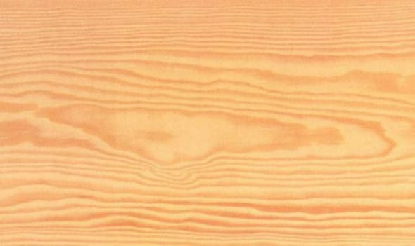 Bright pine wood surface with visible grain patterns
